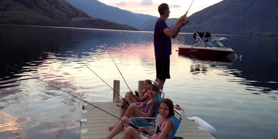 Kids fishing from the dock at the Lodge at Palmer Lake